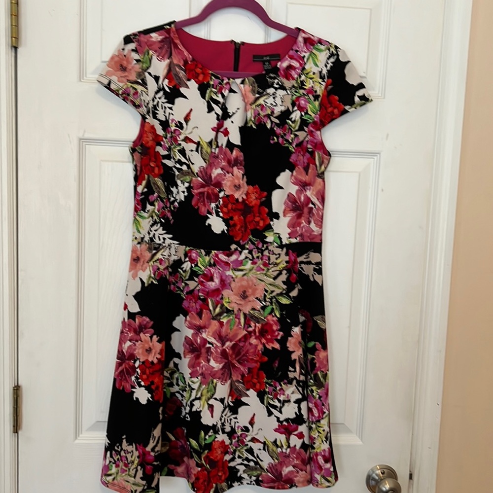 Beautiful black flower print knit dress with full skirt